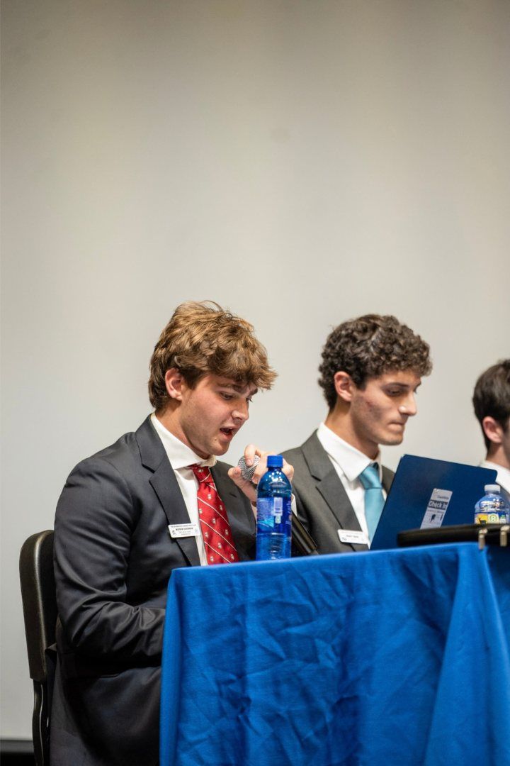 Student moderators at the panel table