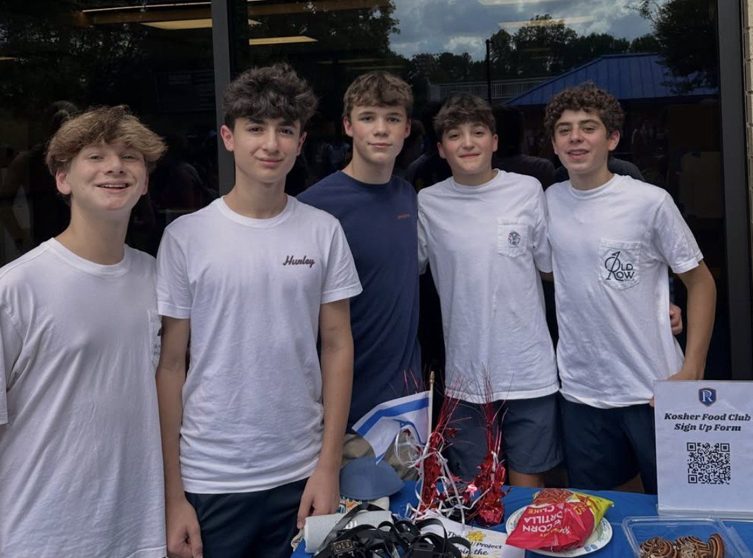 Five underclassmen running the Kosher Food Club table at the 2026 Club Fair